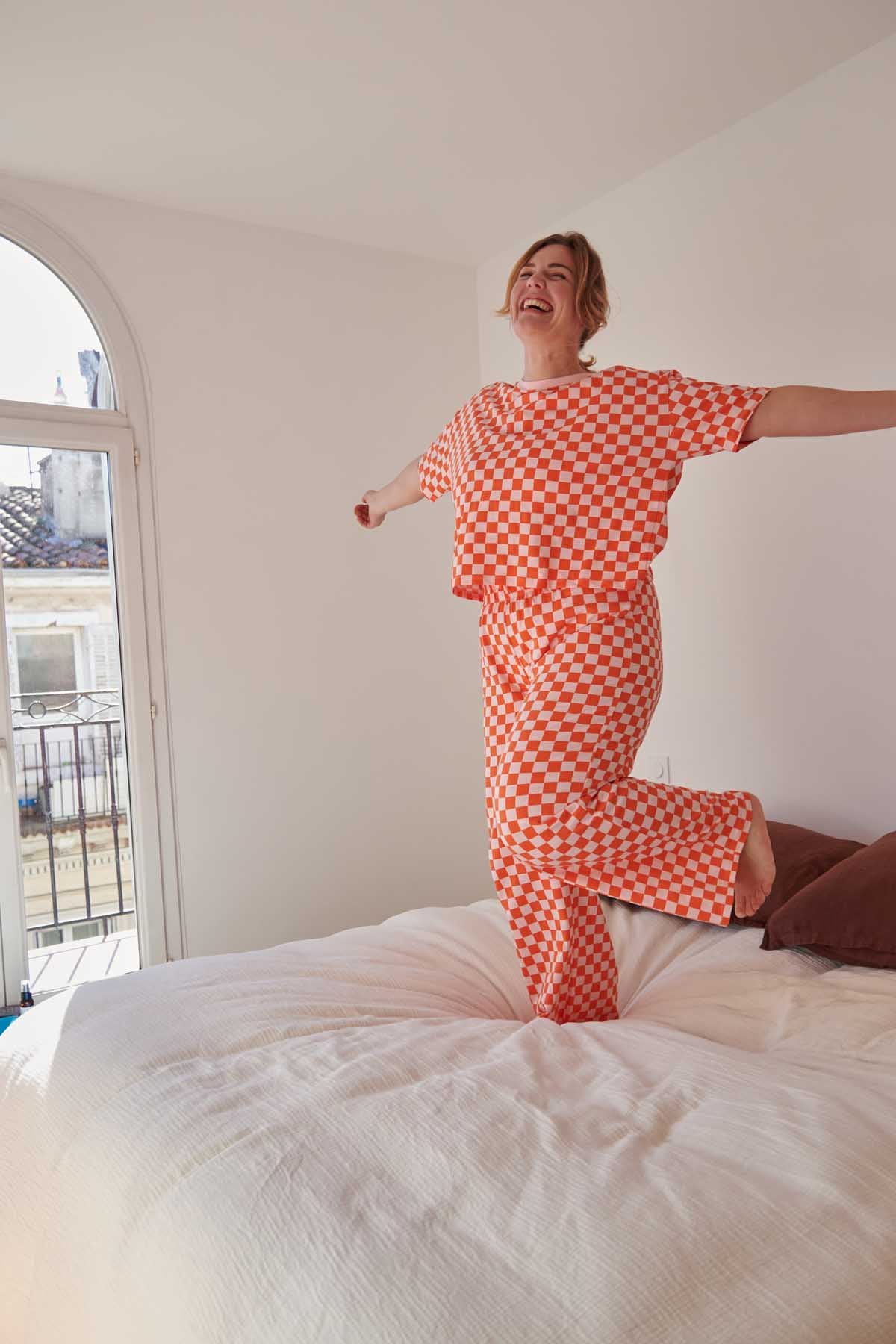 Isaure fait du 42 et porte une taille L