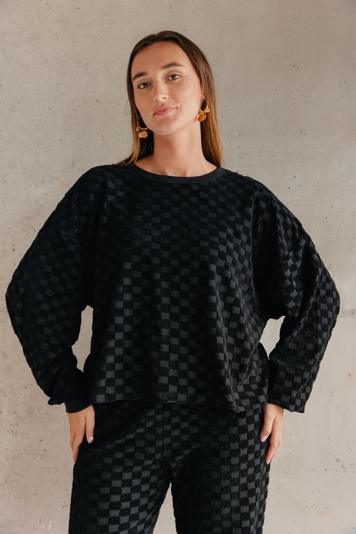 Lorea is a size 38 and wears a size M/L