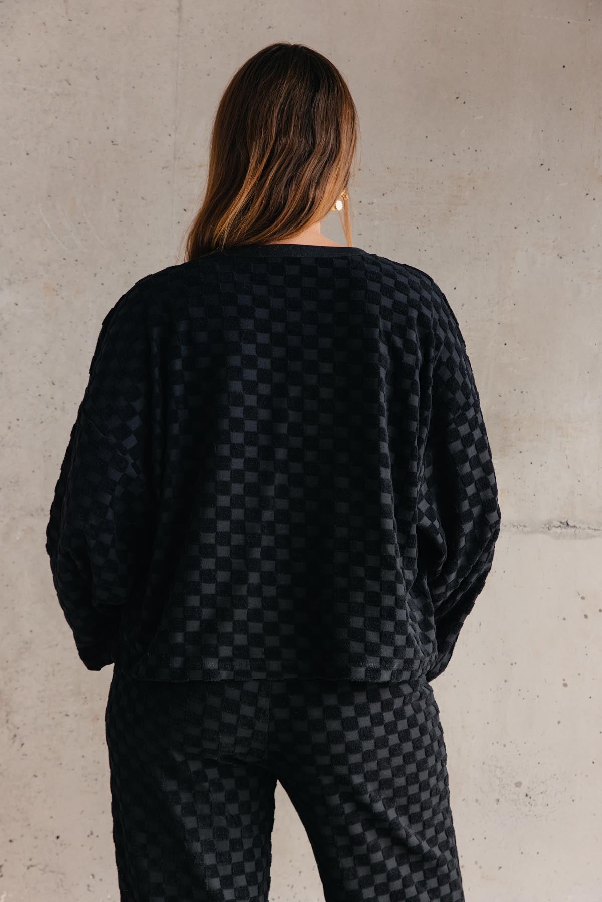 Lorea is a size 38 and wears a size M/L