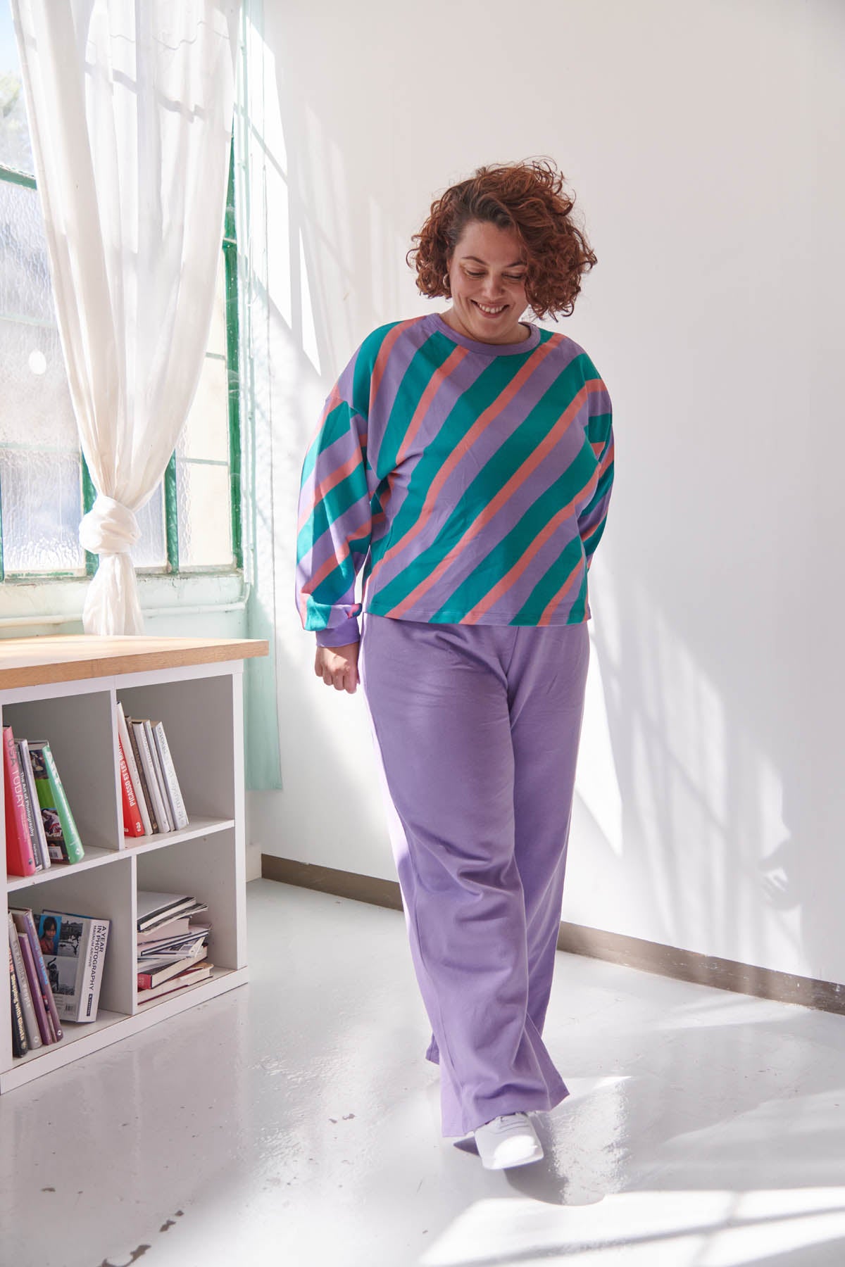 Amandine fait du 44 et porte une taille XL/2XL en haut et 2XL en bas