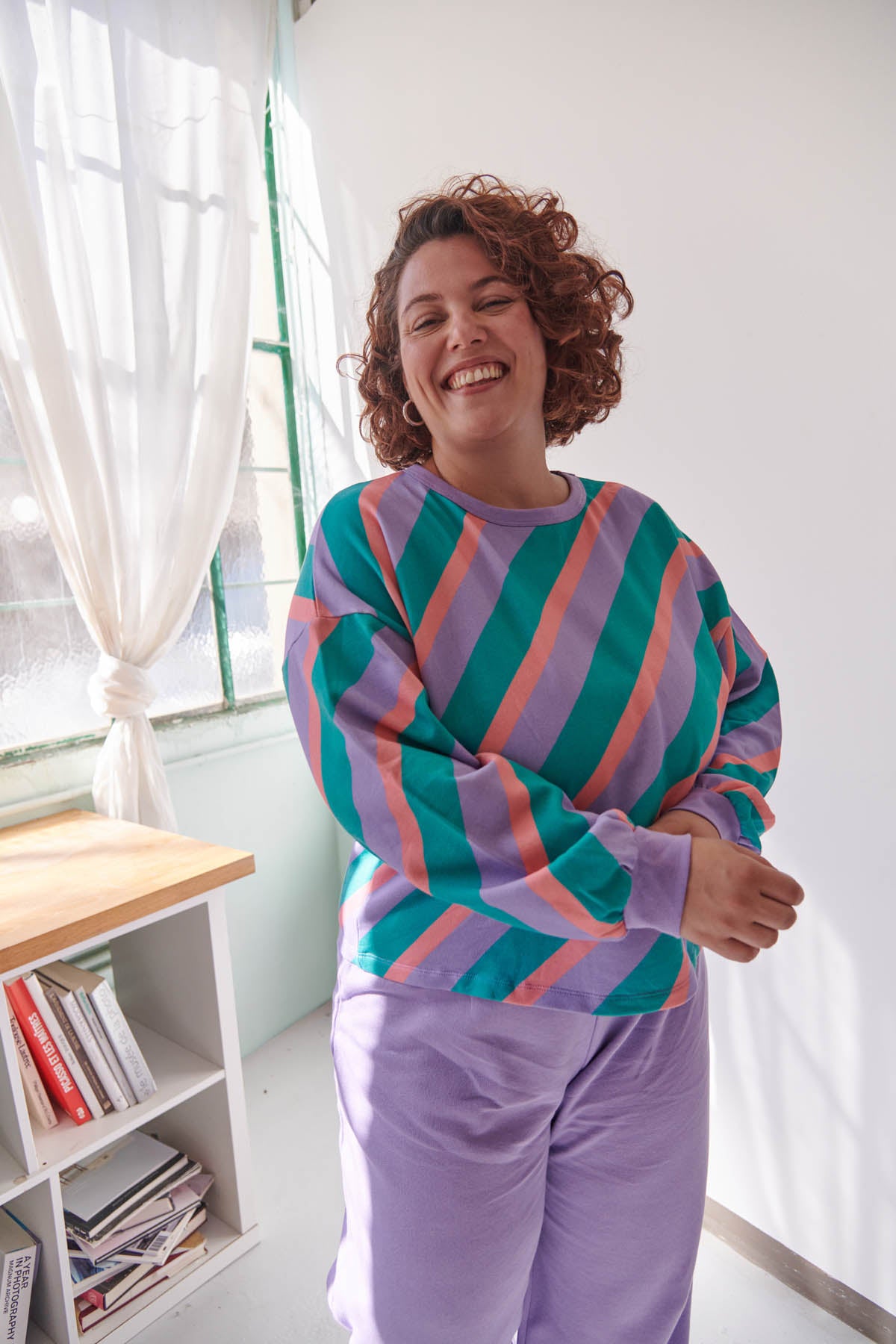 Amandine fait du 44 et porte une taille XL/2XL en haut et 2XL en bas