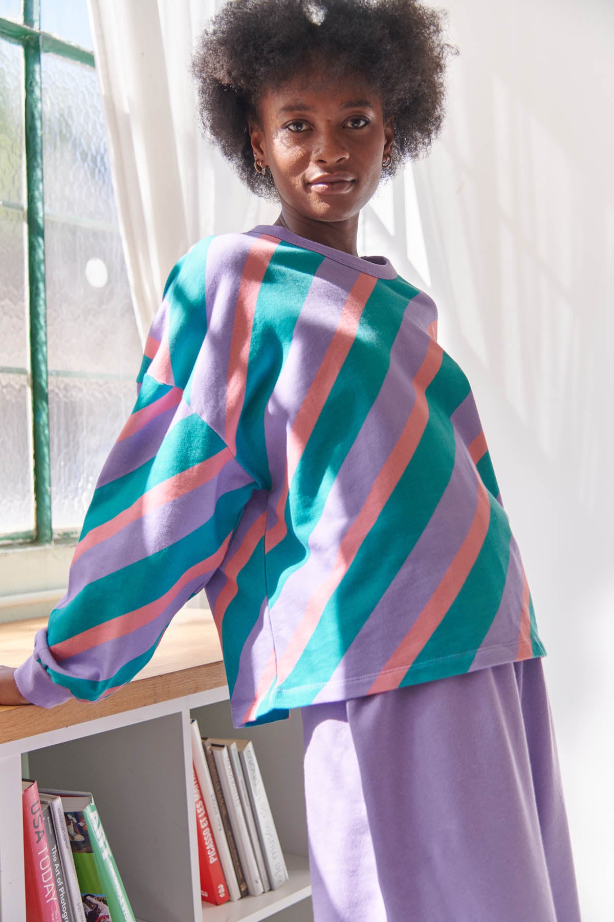 Kathy fait du 34 et porte une taille XS/S en haut et XS en bas