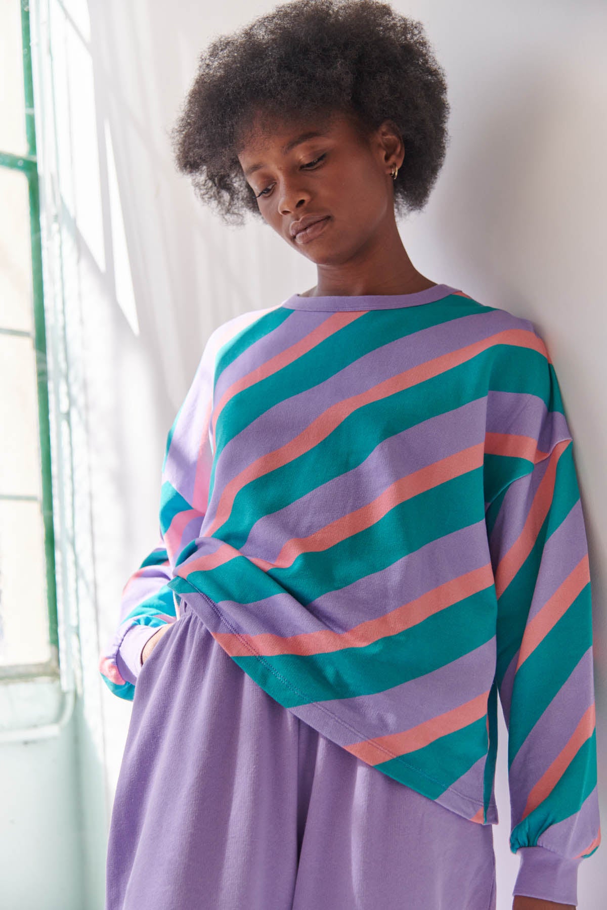 Kathy fait du 34 et porte une taille XS/S en haut et XS en bas