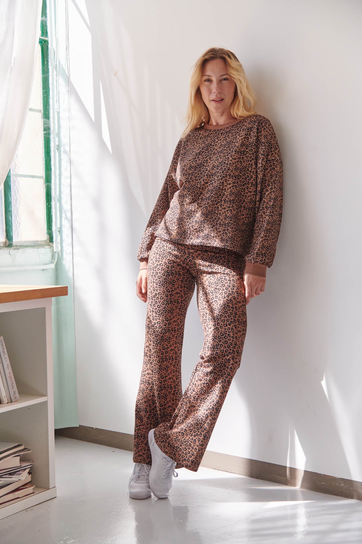 Julie fait du 40 et porte une taille M/L en haut et M en bas