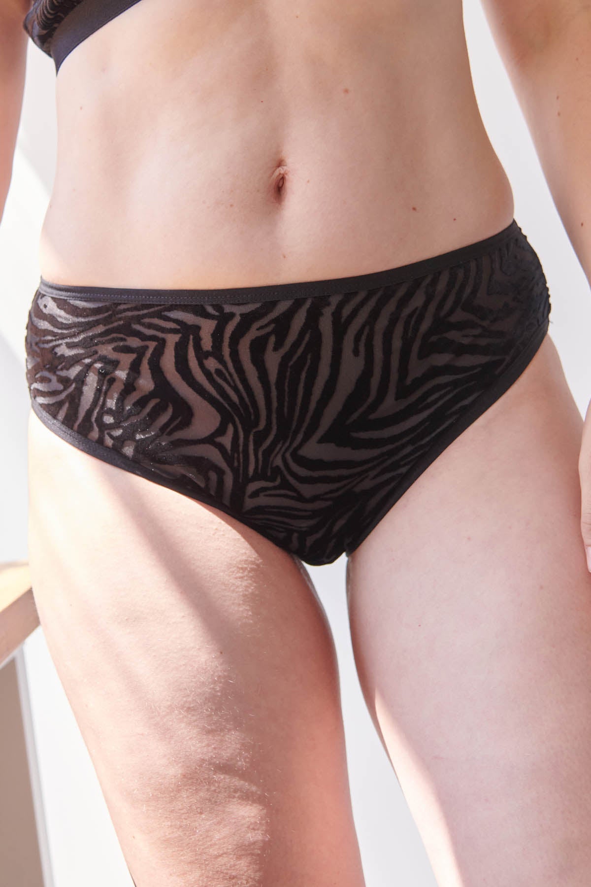 Julie fait du 40 et porte une taille M