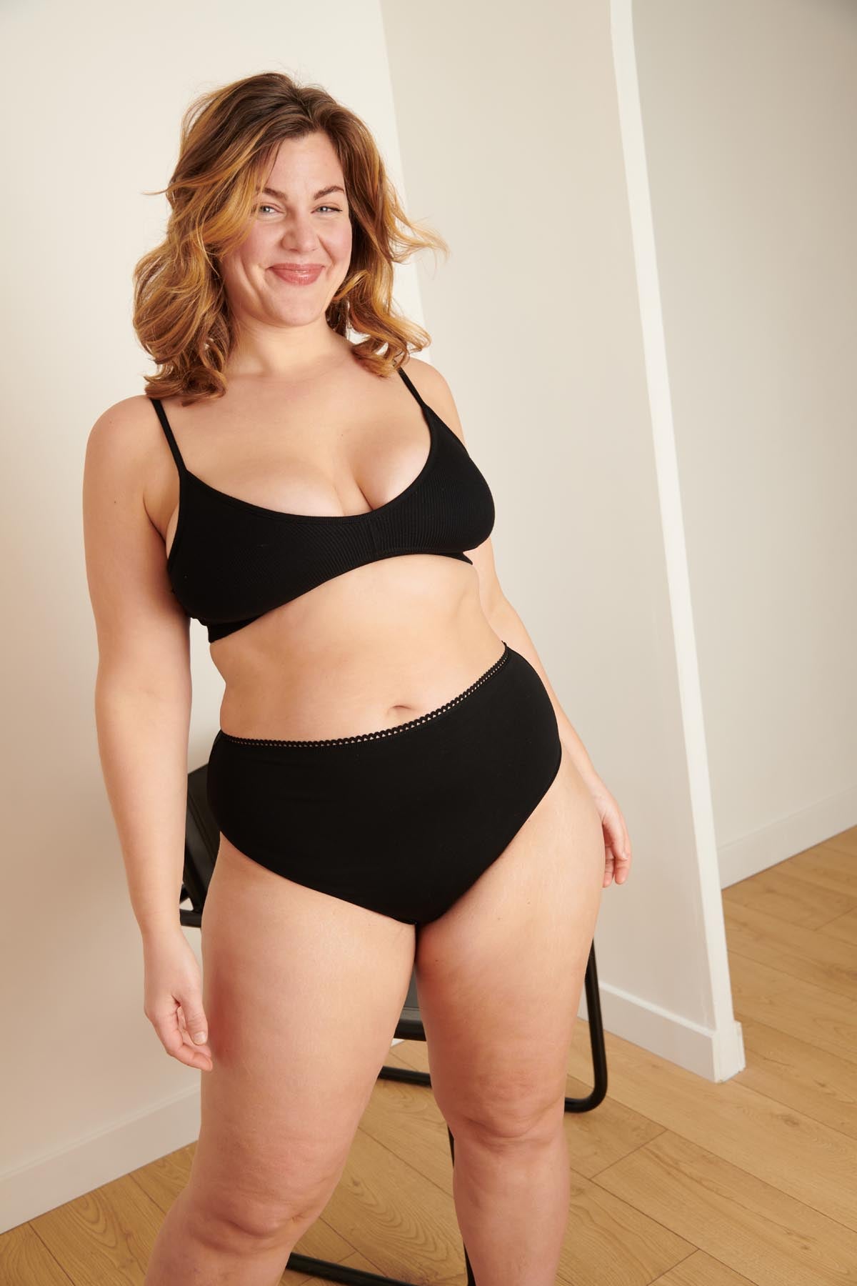 Isaure fait du 42 et porte une taille L