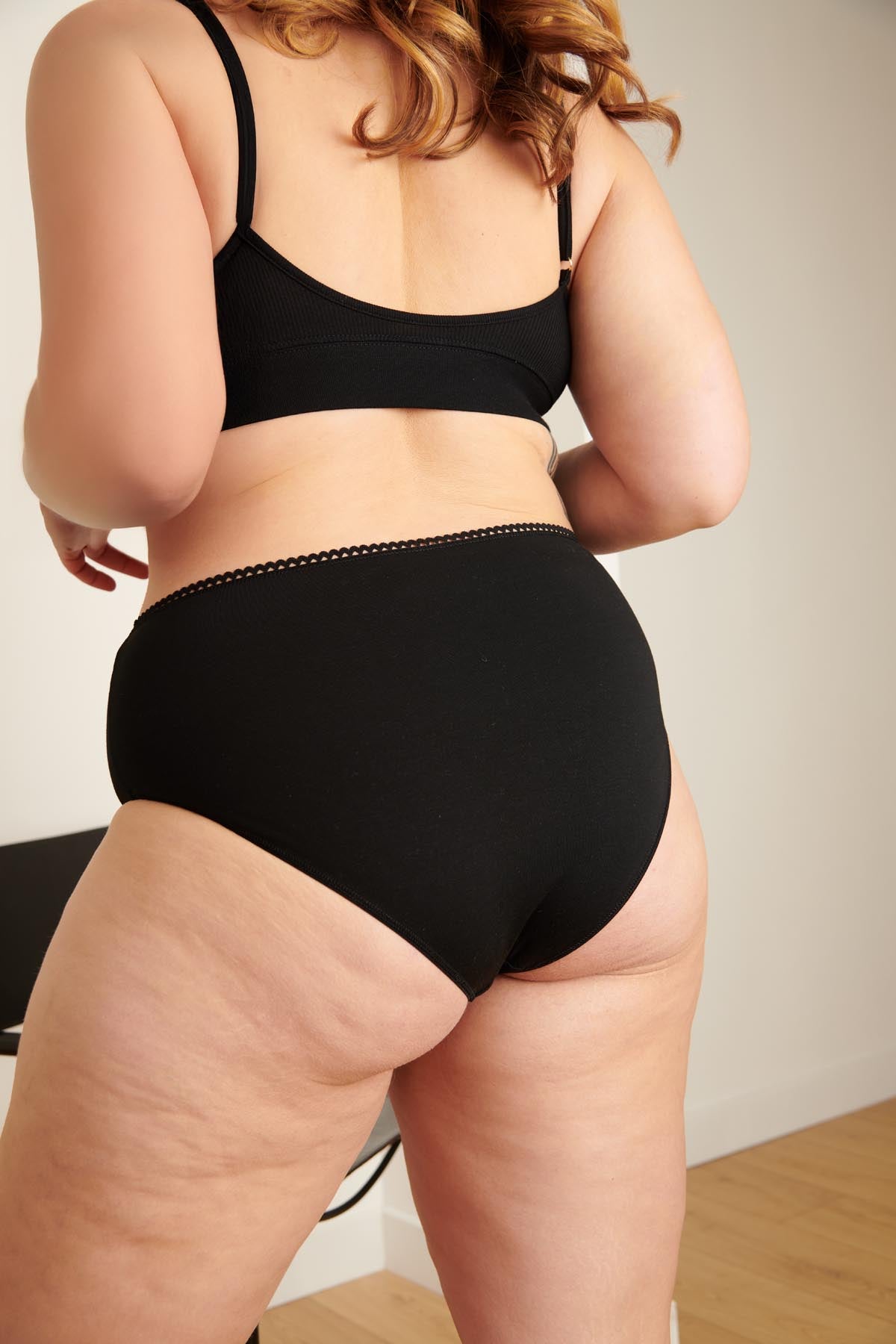 Isaure fait du 42 et porte une taille L