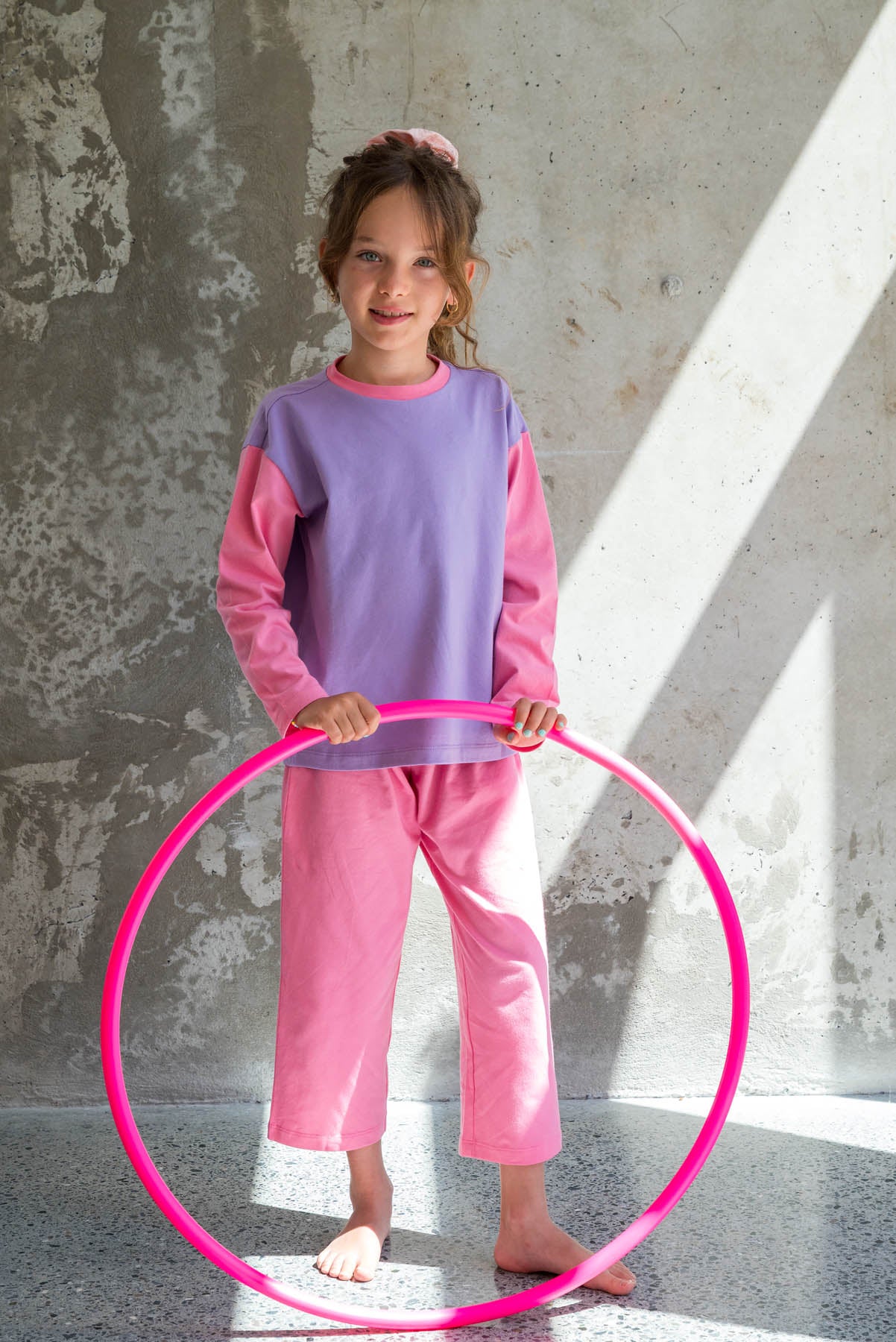 L. porte une taille 7/8 ans