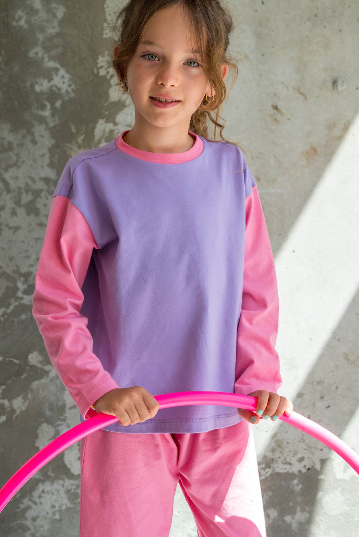 L. porte une taille 7/8 ans
