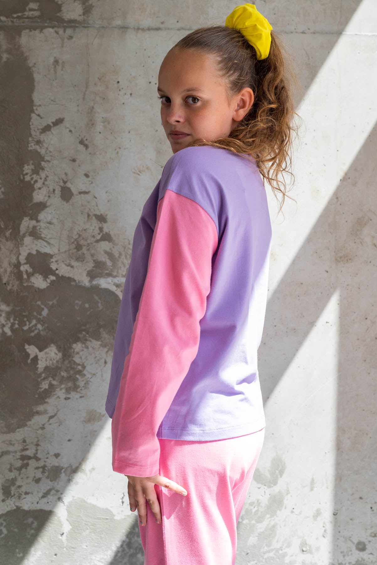 E. porte une taille 11/12 ans