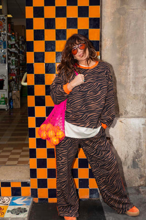 Elsa fait du 38 et porte une taille XS/S en haut et S en bas