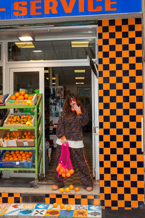 Elsa fait du 38 et porte une taille XS/S en haut et S en bas