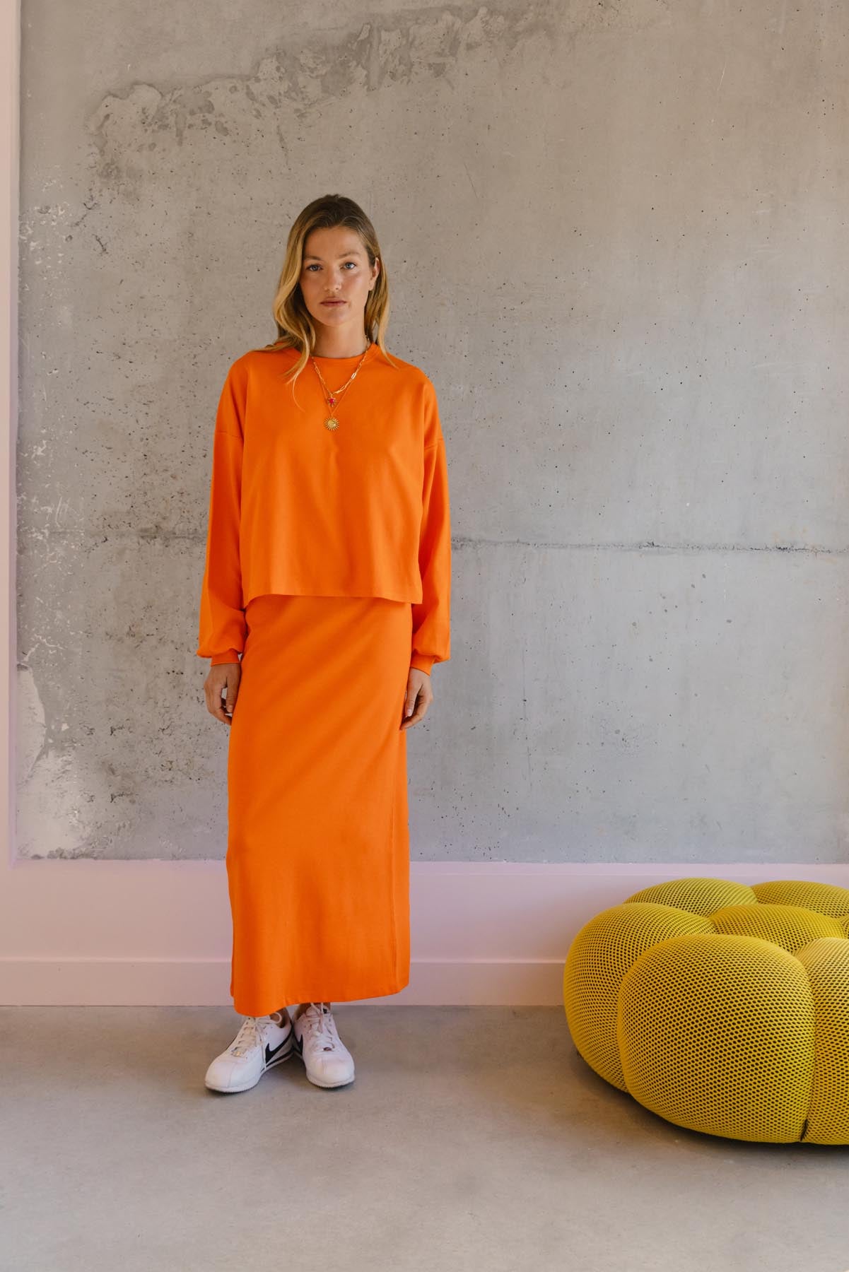 Violette fait du 34 et porte une taille XS en bas et un XS/S en haut