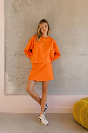 Violette fait du 34 et porte une taille XS en bas et un XS/S en haut