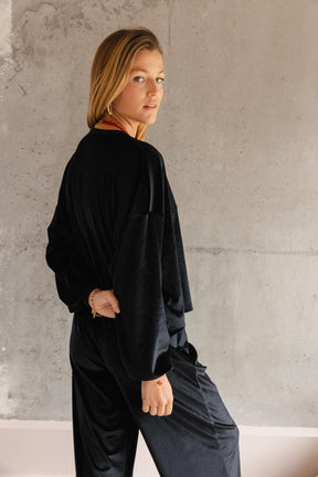 Violette fait du 34 et porte une taille XS/S en haut et une taille XS en bas