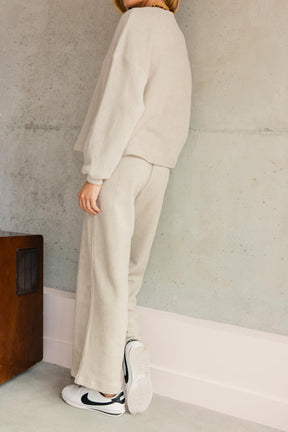 Violette fait du 34 et porte une taille XS/S en haut et XS en bas