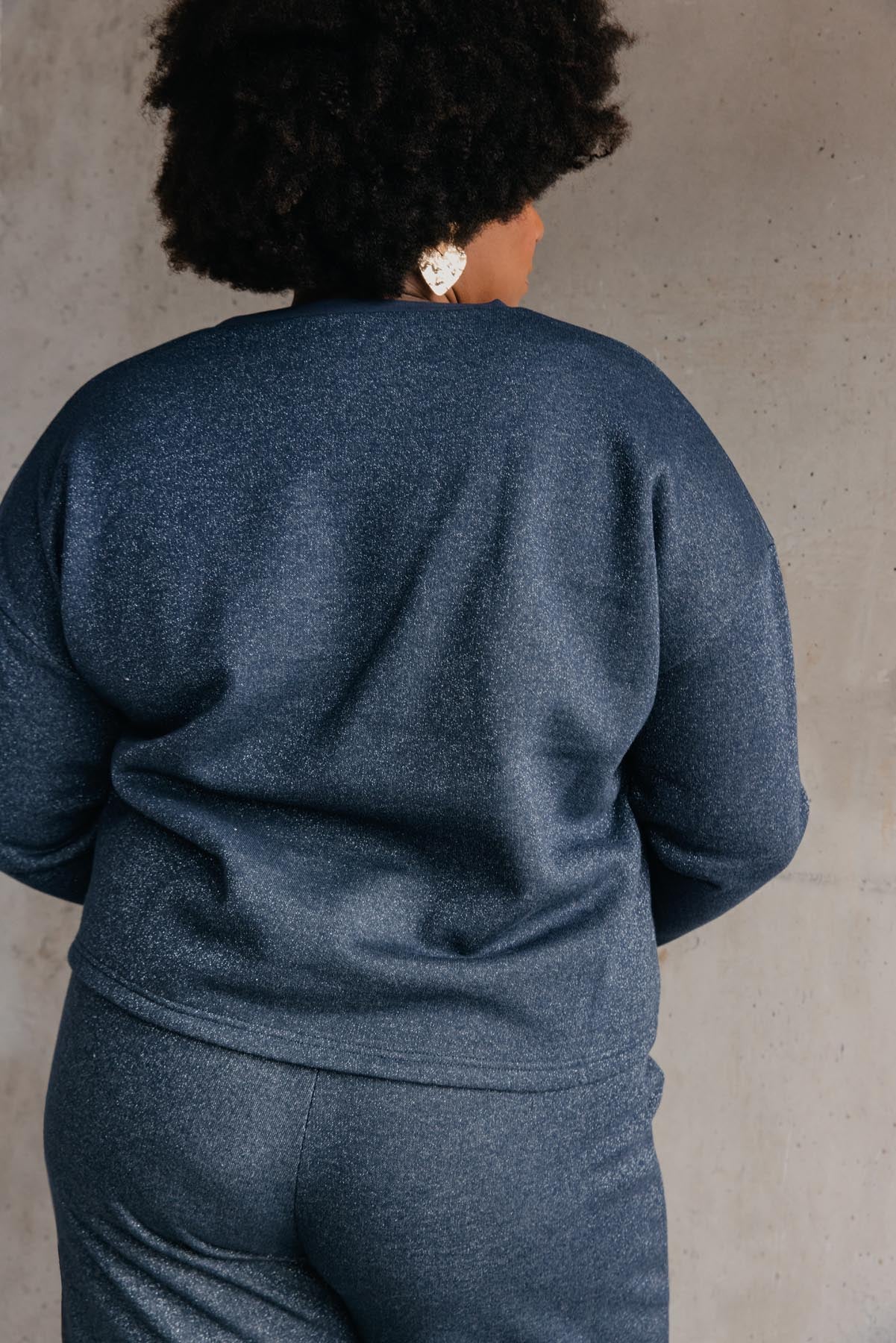 Tiffany fait du 46 et porte une taille 3XL en bas et un 3XL/4XL en haut