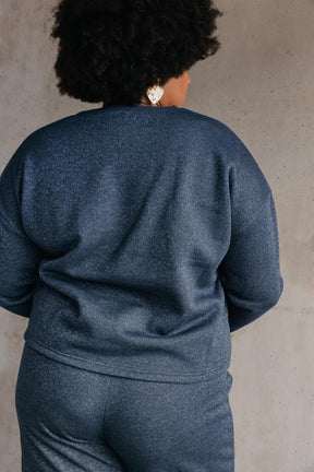 Tiffany fait du 46 et porte une taille 3XL en bas et un 3XL/4XL en haut
