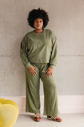 Tiffany fait du 46 et porte une taille 3XL en bas et un 3XL/4XL en haut