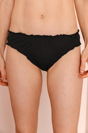 Fannie fait du 34 et porte une taille XS