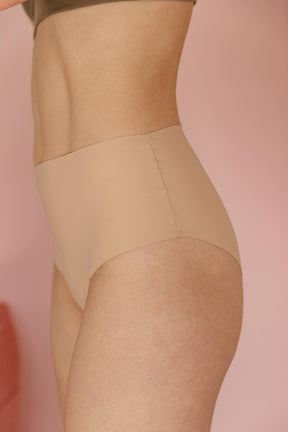 Fannie fait du 34 et porte une taille XS