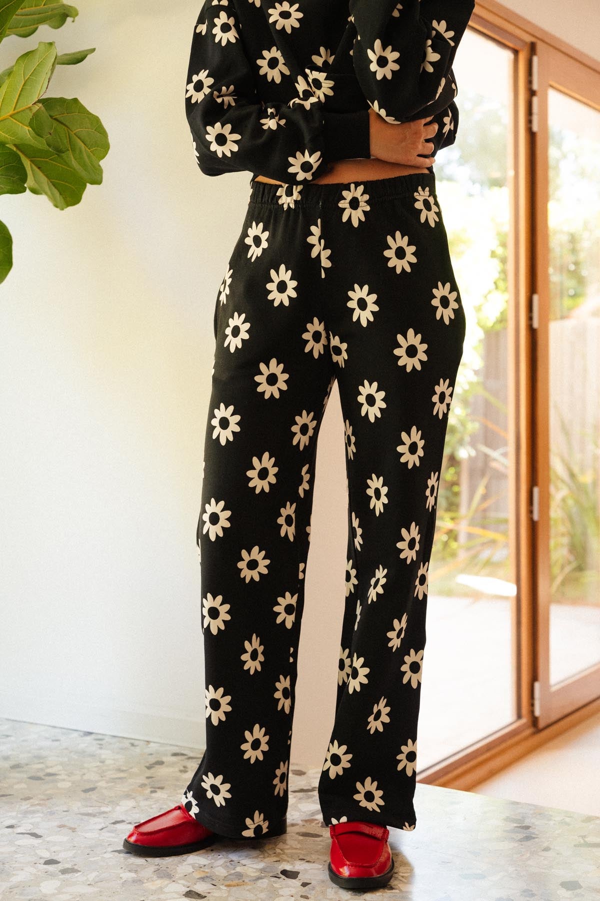 Julie A. is a size 36 and wears a size XS/S on top and XS on the bottom