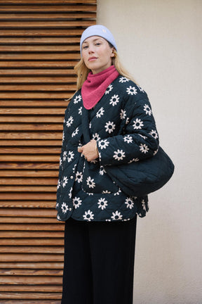 Julie D. is a size 38 and wears a size M/L