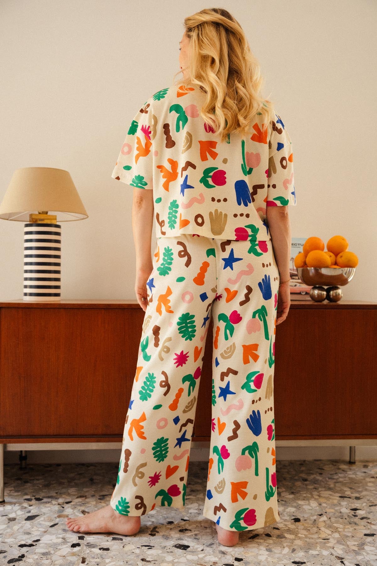 Julie D. fait du 38 et porte une taille M