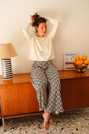 Julie A. fait du 36 et porte une taille XS