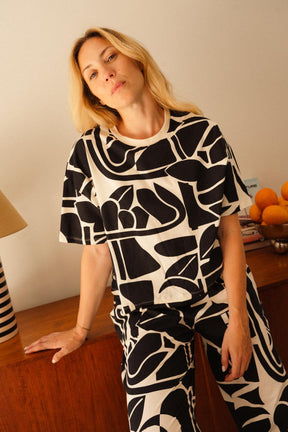 Julie D. fait du 38 et porte une taille M