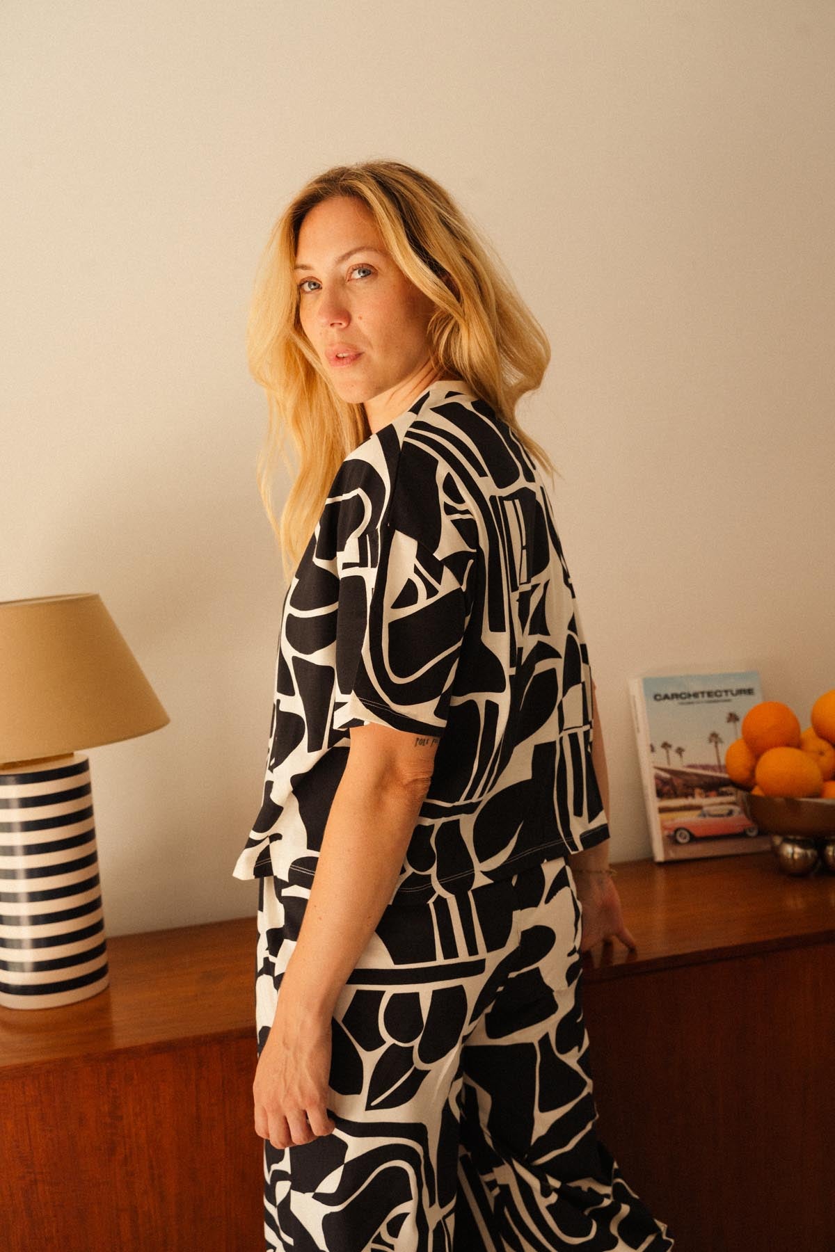 Julie D. fait du 38 et porte une taille M