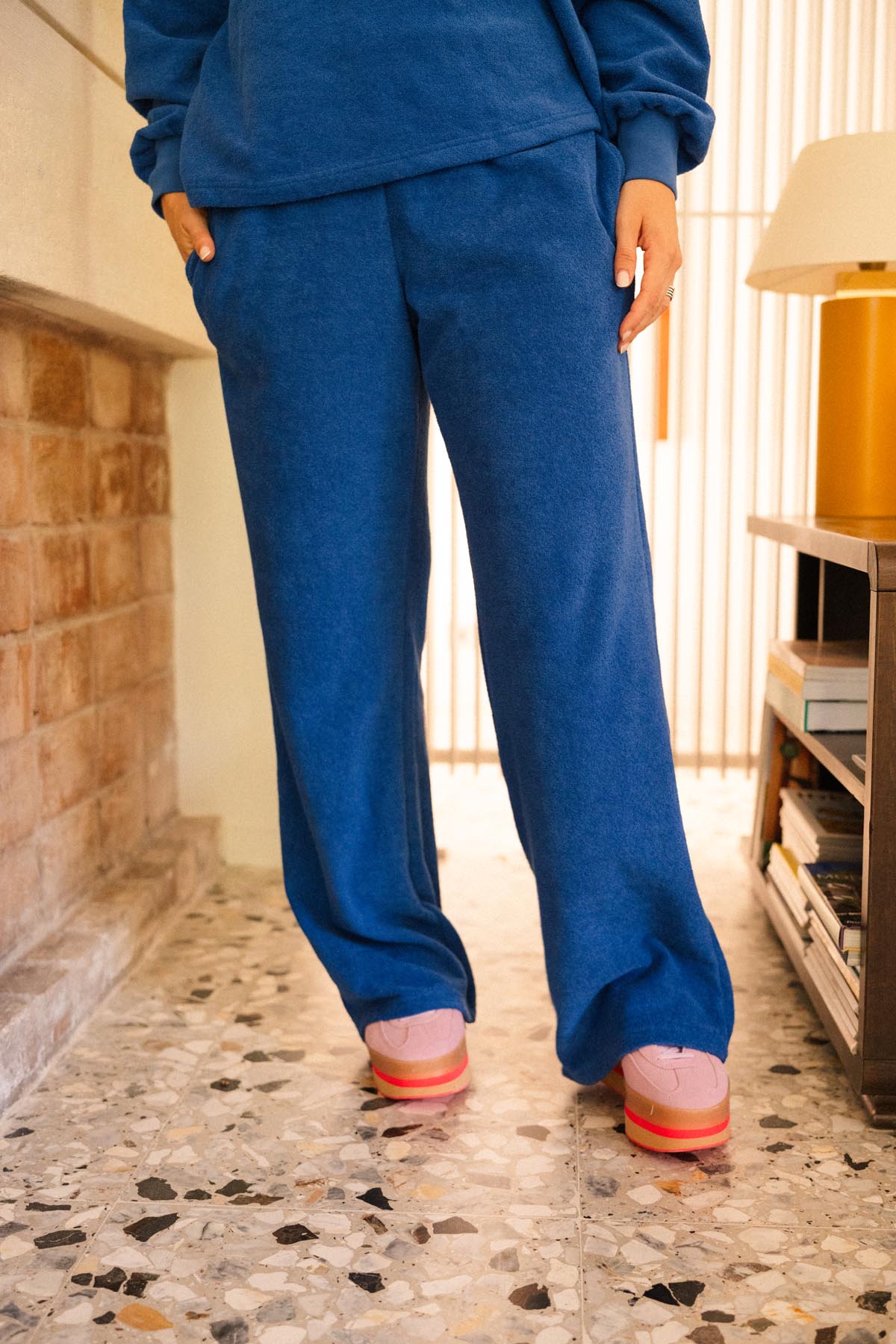 Julie D. is a size 38 and wears a size M/L on top and M on the bottom