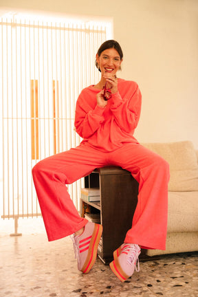 Julie A. fait du 36 et porte une taille XS/S en haut et du XS en bas