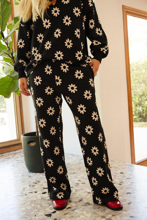Julie D. is a size 38 and wears a size M/L on top and M on the bottom