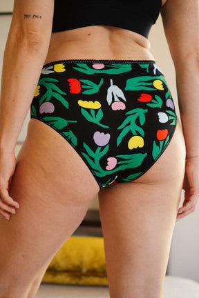 Julie D. fait du 38 et porte une taille M