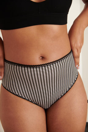 Marie-Charles fait du 38 et porte une taille M