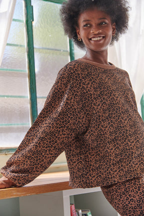 Kathy fait du 34 et porte une taille XS/S en haut et XS en bas