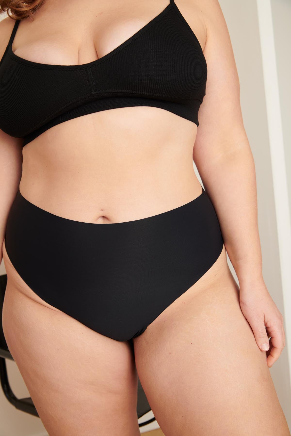 Isaure fait du 42 et porte une taille L
