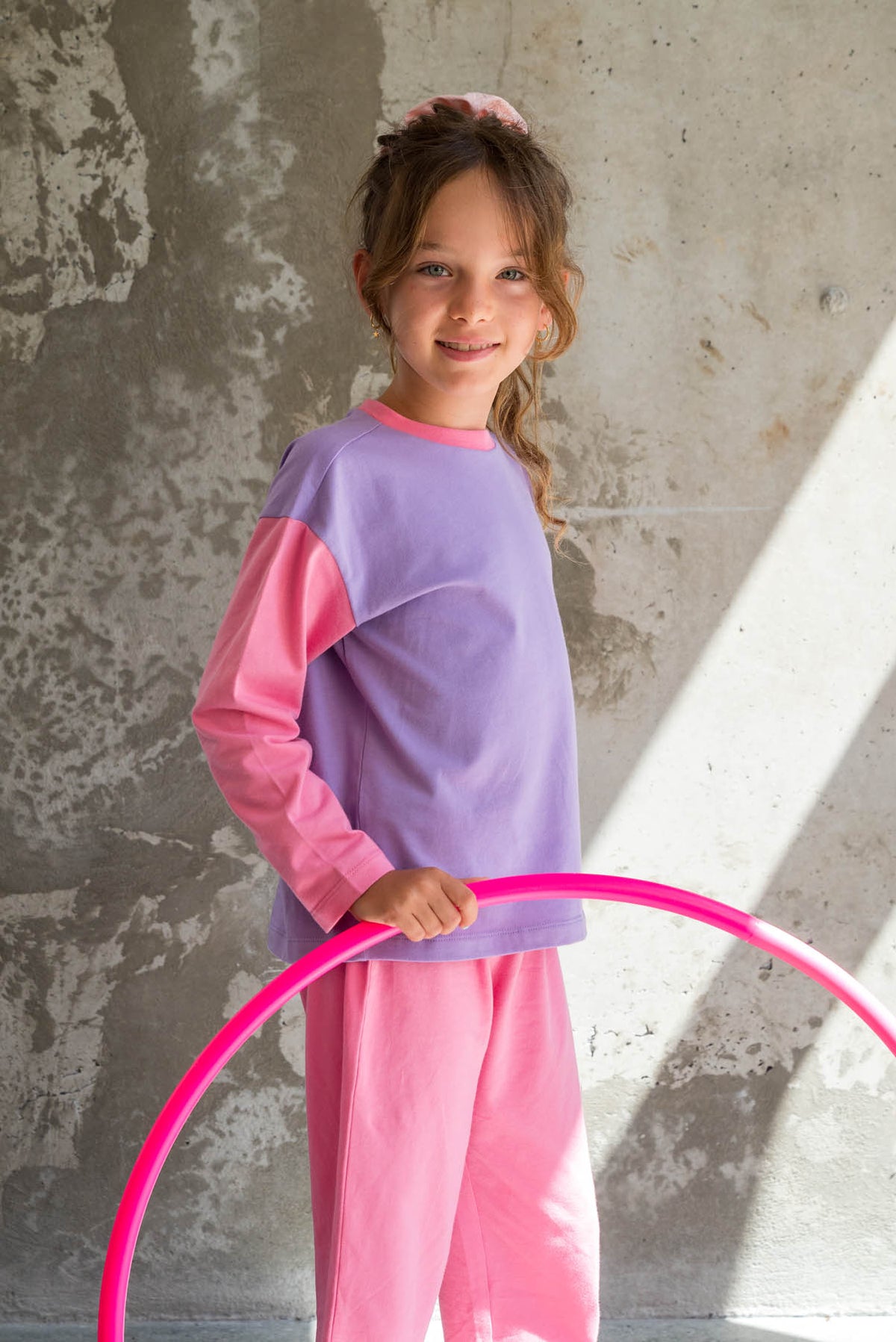 L. porte une taille 7/8 ans*
